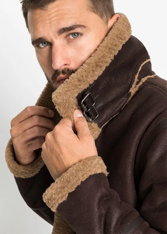 Korte imitatieleren jack met teddy voering, bonprix