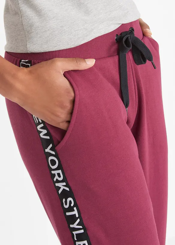 Sweatpants met tapes en statement print, bonprix