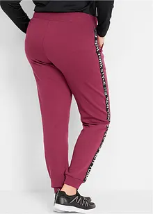 Sweatpants met tapes en statement print, bonprix