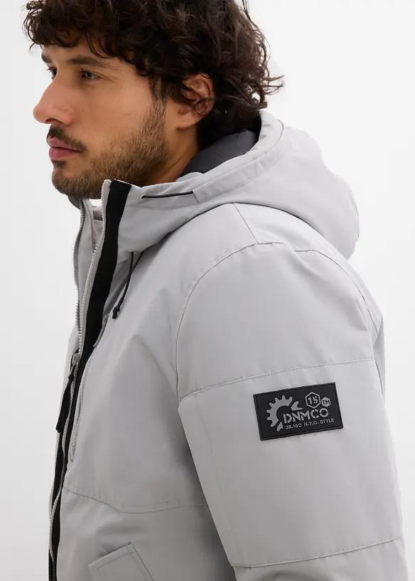 Winterbomber met sportieve details, bonprix